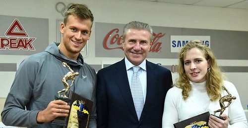 Плавець Романчук та борчиня Черкасова отримали нагороди від НОК