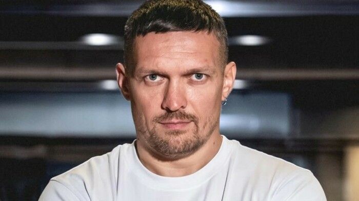 ФОТО. Усик посетил матч Лиги чемпионов. Его выбор был очевиден