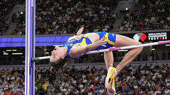 Jumping in height. Maguchih shared third place on the World Cup in rainy conditions
