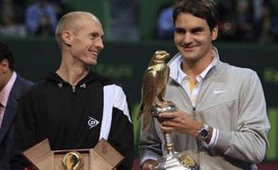 Федерер переиграл Давыденко в финале турнира в Дохе