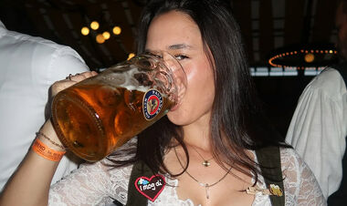Photo. A native of Kiev Fox drank beer on Oktoberfest in fire dress