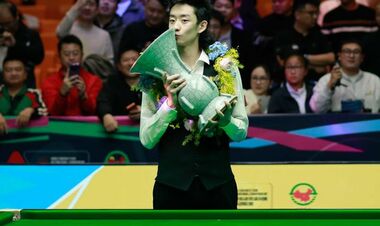 Китаец У Ицзе впервые выиграл рейтинговый турнир, одолев Джона Хиггинса