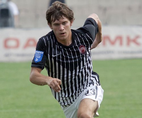 Максим Белый